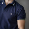 Playera polo elite marino y verde POL0010 — vista posterior