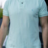 Playera polo menta POL0011 — vista posterior